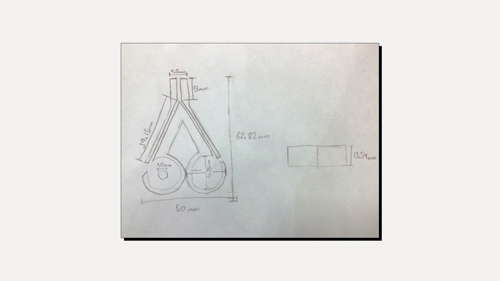Sketch of a whistle, annotated with dimensions.