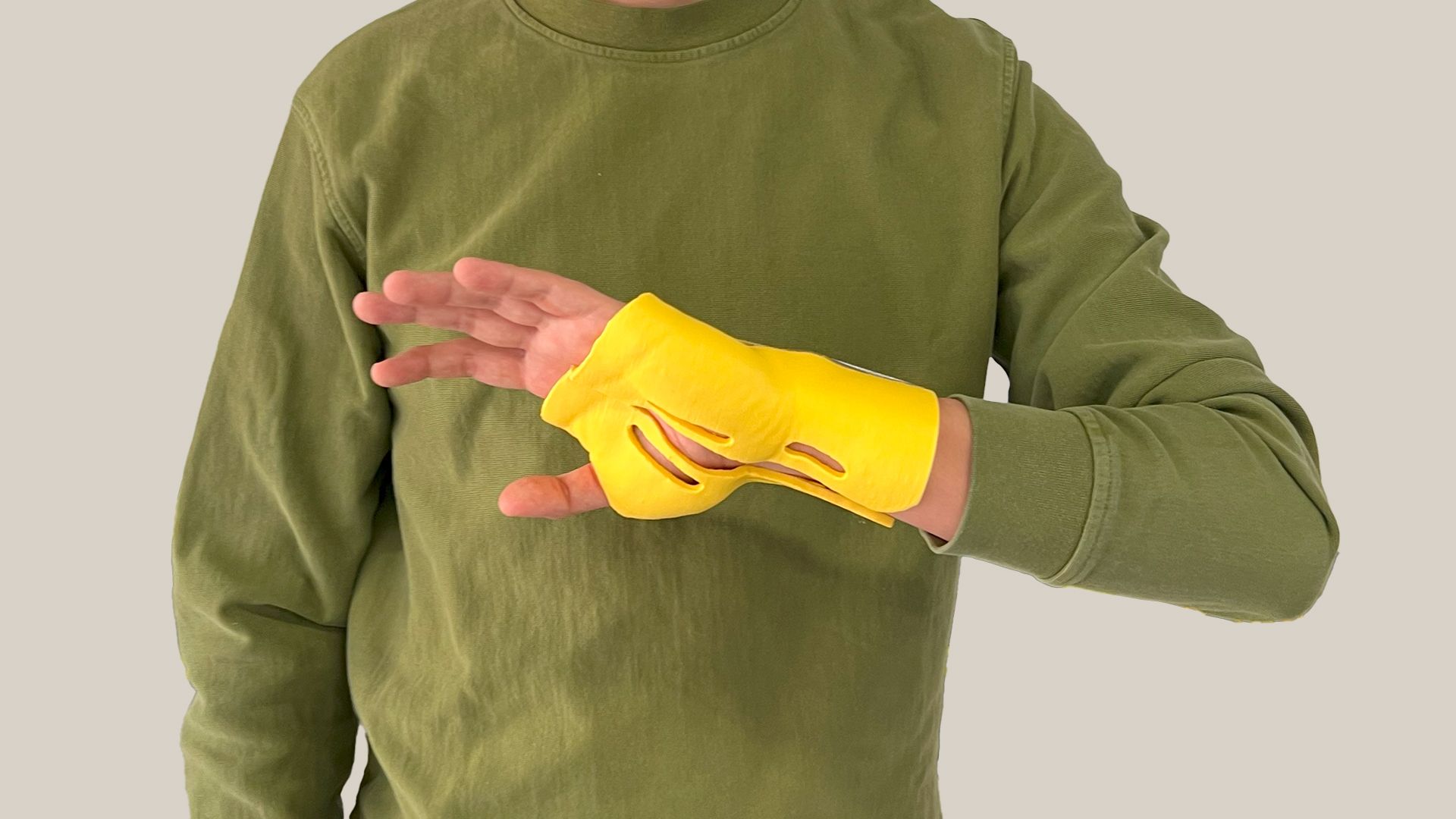Maker Educator Jose Antonio wearing a 3D printed wrist orthosis.