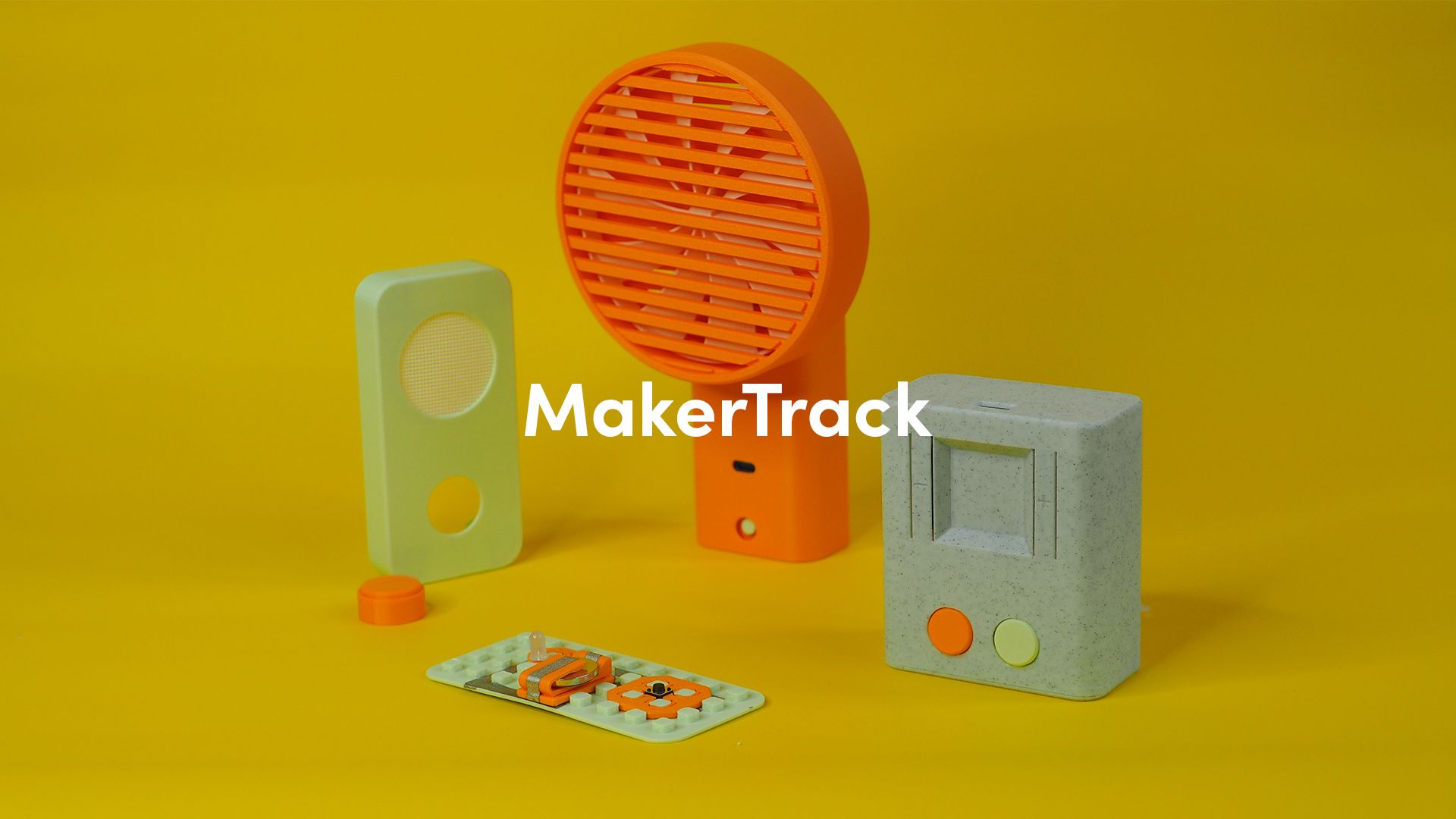 The MakerTrack LED flashlight, fan and gamepad on a yellow background. The title 'MakerTrack' overlaid in white text.