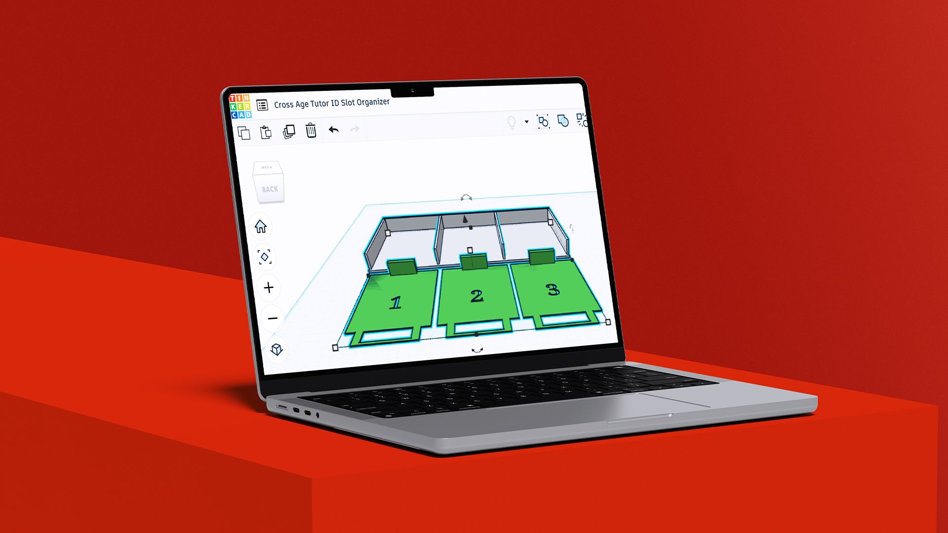 A macbook laptop showing a Tinkercad 3D model of ID card organisers.