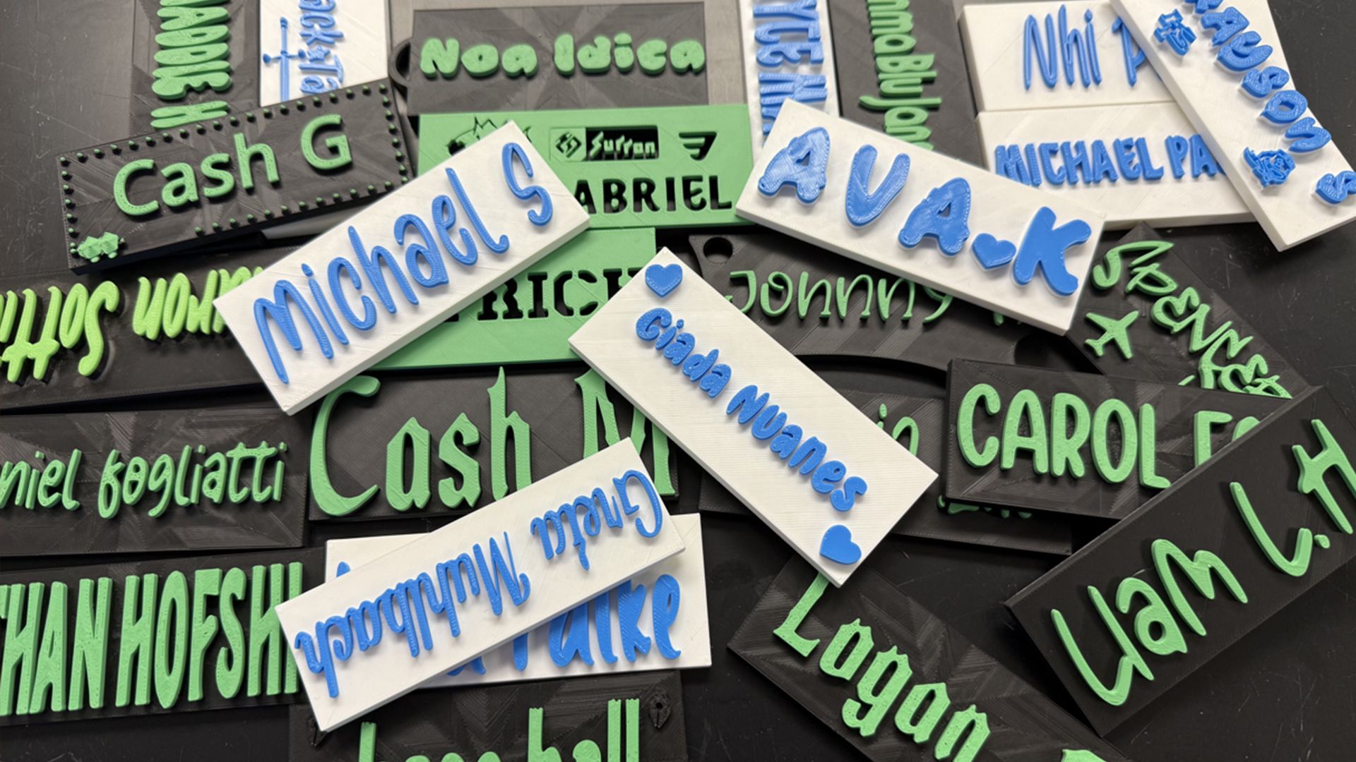 3D printed nameplates with student names on.