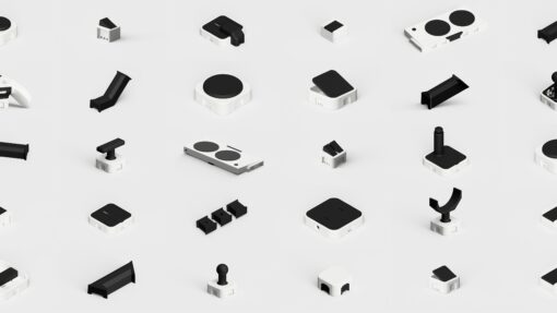 Render showing the PrintSwitch ecosystem with a selection of modular 3D printed assistive switches, joysticks, interface docks, connectors and accessories arranged in a clean grid on a light background.